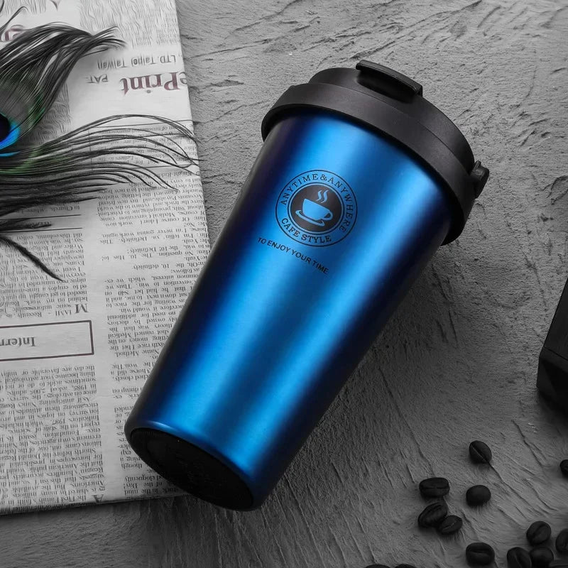 Dark blue insulated stainless steel travel mug with lid