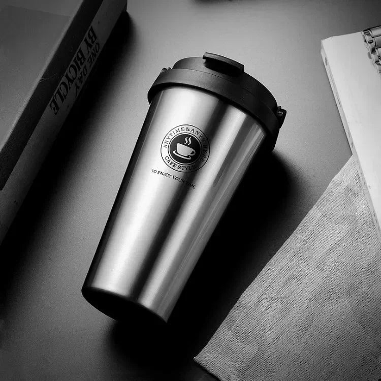 Silver insulated stainless steel travel mug with lid