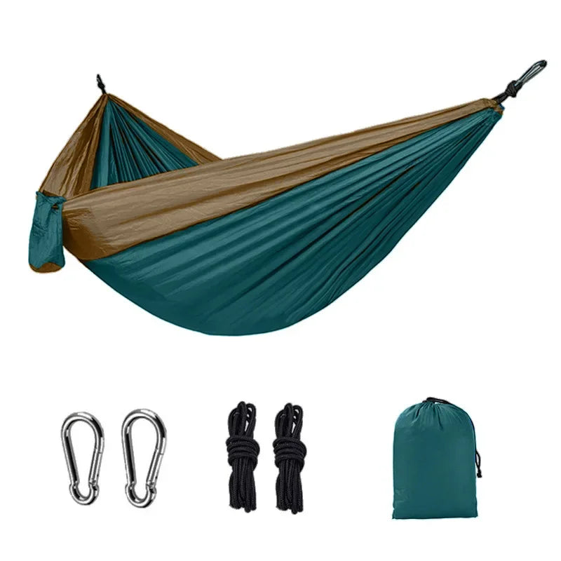 Teal and khaki camping hammock with carabiners, ropes and storage bag